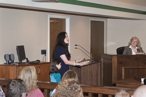 Emiko speaking to the Mayor and City Council.