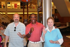 Mel Moore, PGA golfer Kevin Hall, and Nema Moore